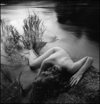 Gold River, Nova Scotia - 1999. This is one of my favorite water nudes, combining the hard, solid tones of the dark rock, and the fluid, ethereal look of blurred water. Intermixed with this is Victoria