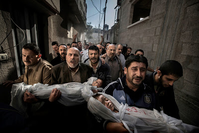 World Press Photo of the year 2013 - City Burial by Paul Hansen - Feb. 2013