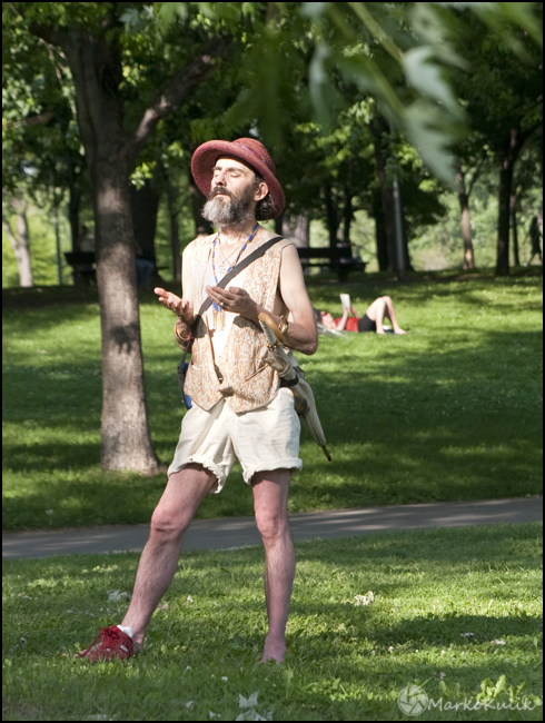 Stranger meditating in Parc La Fontaine in Montreal, QC.