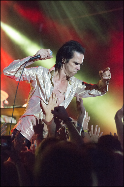 Nick Cave Osheaga 2014 by Marko Kulik - This high ISO image was made using aperture priority and I moved the focus points over the hand invading Nick's shirt. Moving those focus points is my favourite essential camera feature.